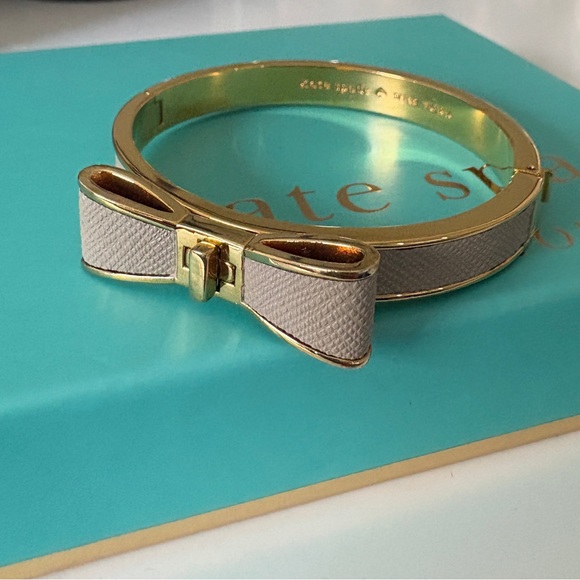 Kate Spade Gold and Beige Leather Bow Bangle - Picture 1 of 4